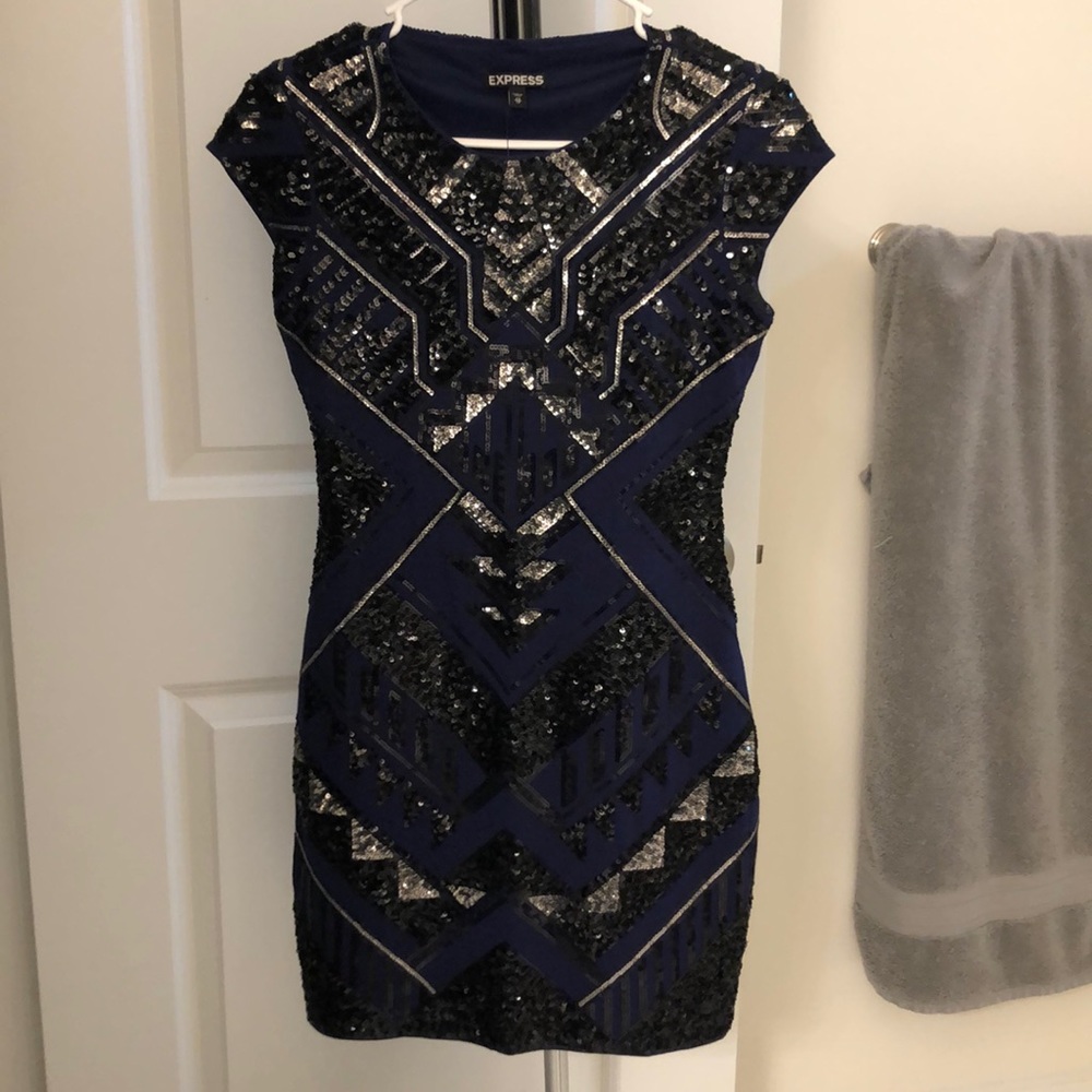 NWT Express dress. Never worn! Navy blue with black and silver sequins.